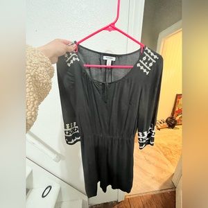 A black dress with embroidery